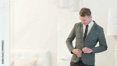 Handsome man posing in suit