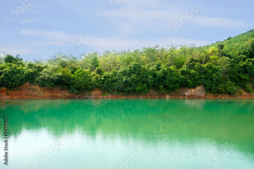 Fototapeta Naklejka Na Ścianę i Meble -  Green water lake in the Mountains.