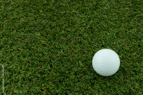 A golf ball on grass, Closeup shoot.