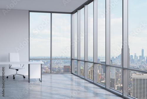 Work space in a modern panoramic corner office in New York.