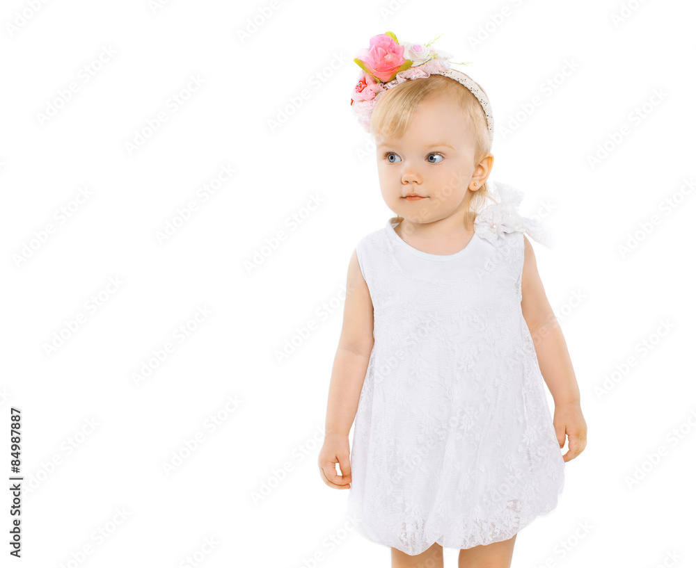 Little girl with floral wreath on head on a white background Little girl with floral wreath on head on a white background