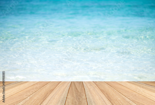 Blurred sea background and wooden floor