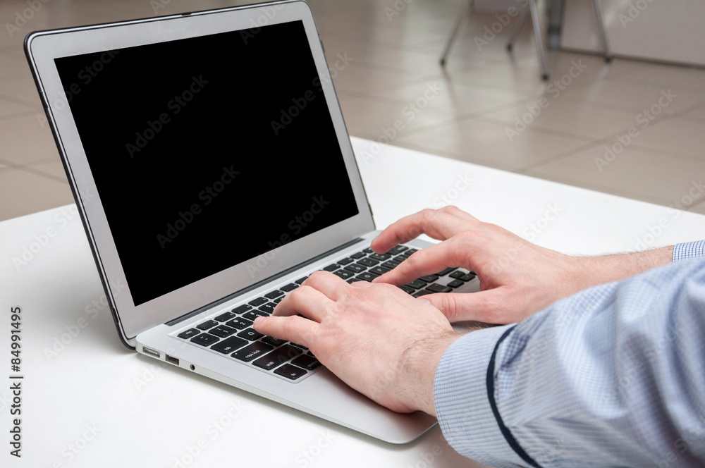 Man's hands typing on laptop. Internet surfing. Programming code Man's hands typing on laptop. Internet surfing. Programming code
