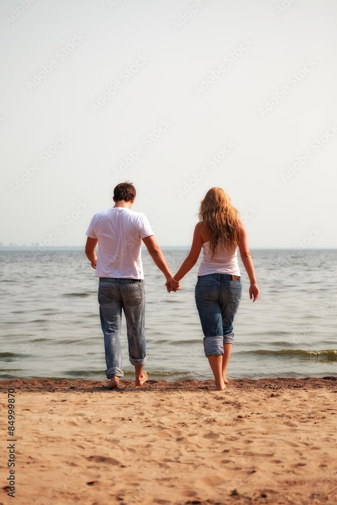 couple walking on a beach