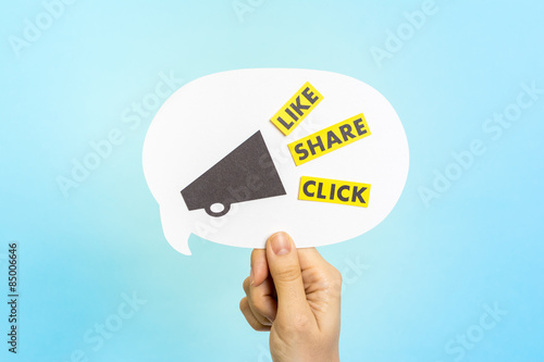 Social media words: Link, share, click. Speech bubble showing a megaphone and words on blue background. photo