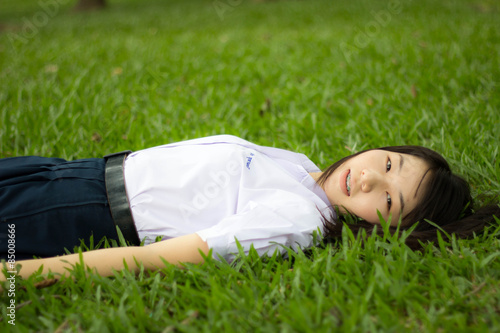 thai student teen relax Sitting On Park © tiniroma