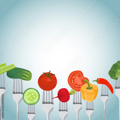Colorful Background made of vegetables on the forks