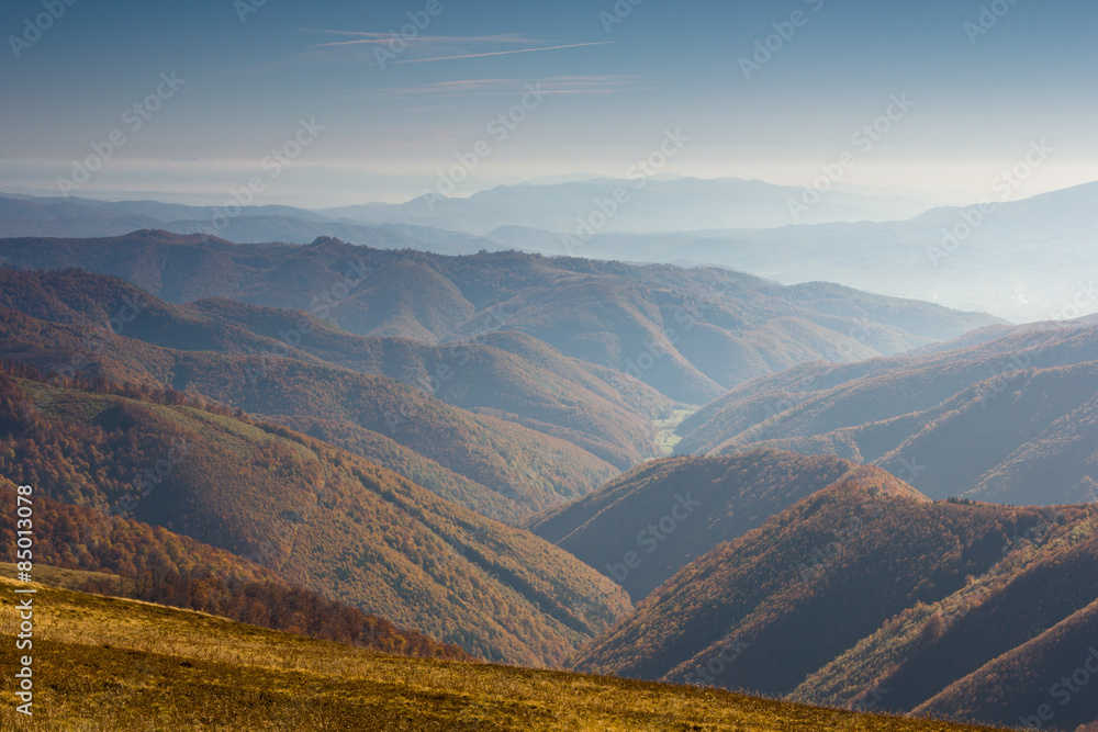 Autumn landscape in mountain valleys.