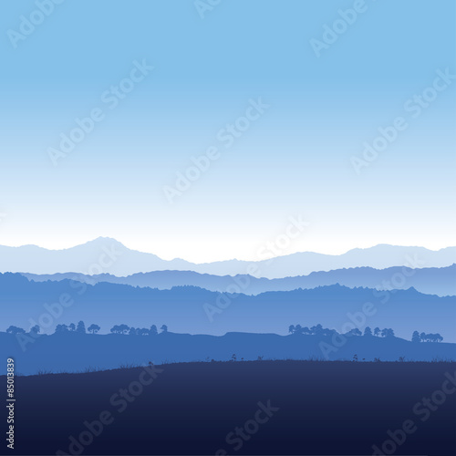 Landscape of mountains in fog