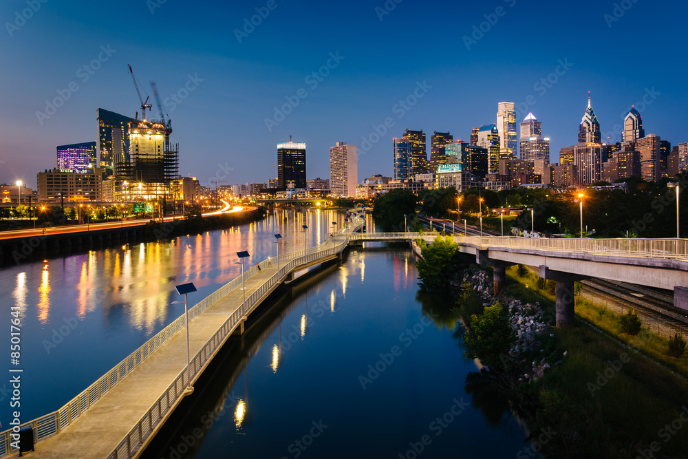 The skyline and Schuylkill Banks Boardwalk seen at night from th