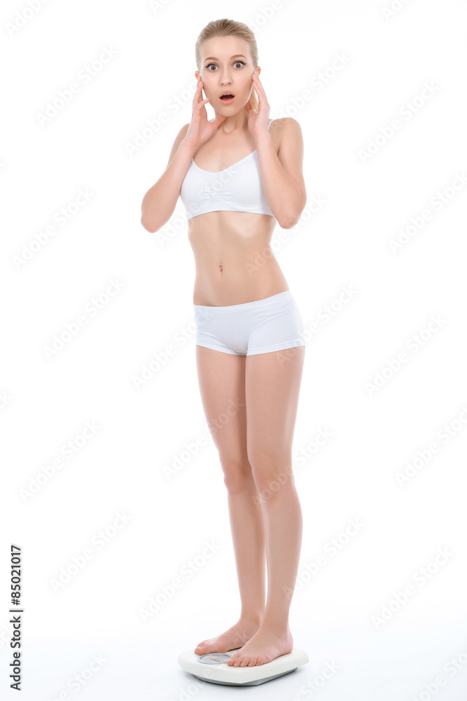 Young fit blond girl isolated on white Young fit blond girl isolated on white