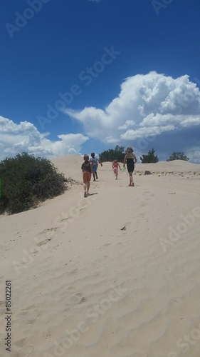 Kids on sand dunes