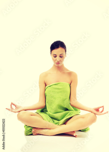 Fotografija Front view woman sitting excercising yoga