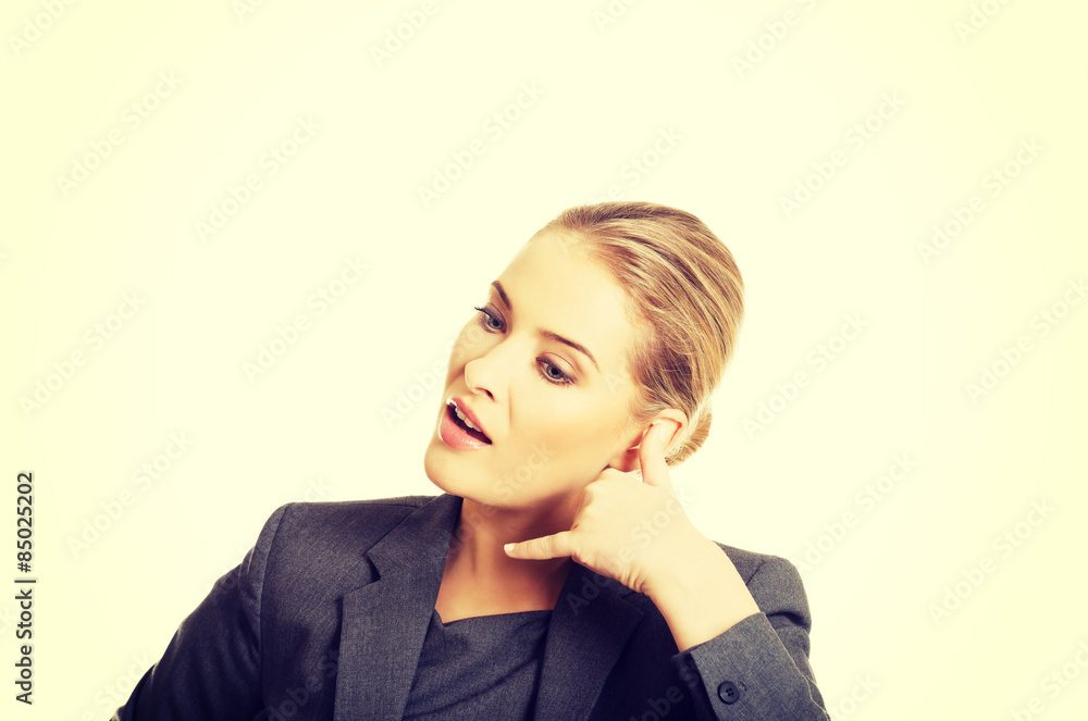 Fototapeta premium Woman making phone gesture