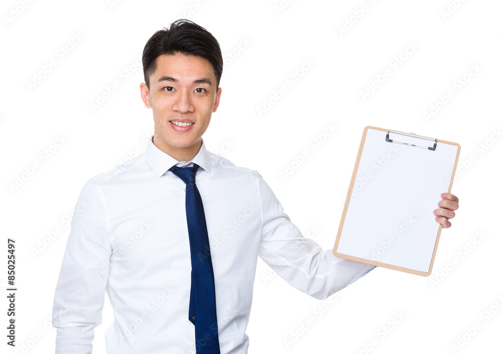 Businessman showing with clipboard and white paper Businessman showing with clipboard and white paper