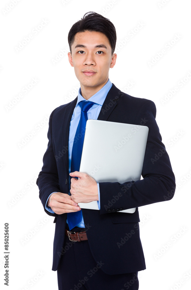 Young businessman holding with laptop computer Young businessman holding with laptop computer