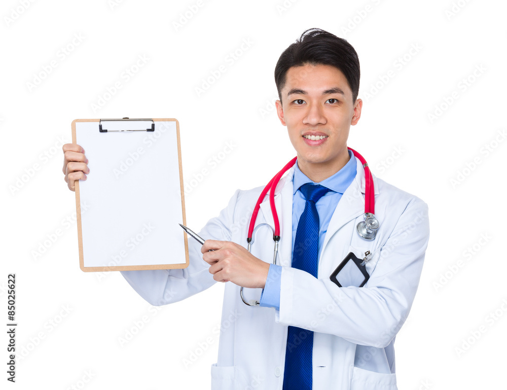 Doctor man pen point to the blank page on clipboard Doctor man pen point to the blank page on clipboard
