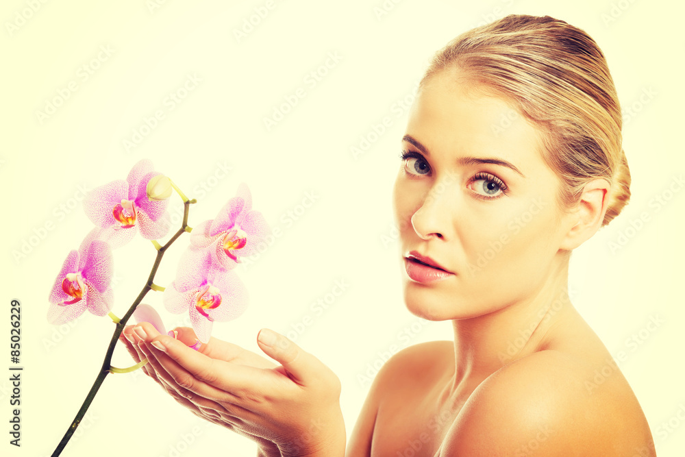 Fototapeta premium Spa woman with purple orchid