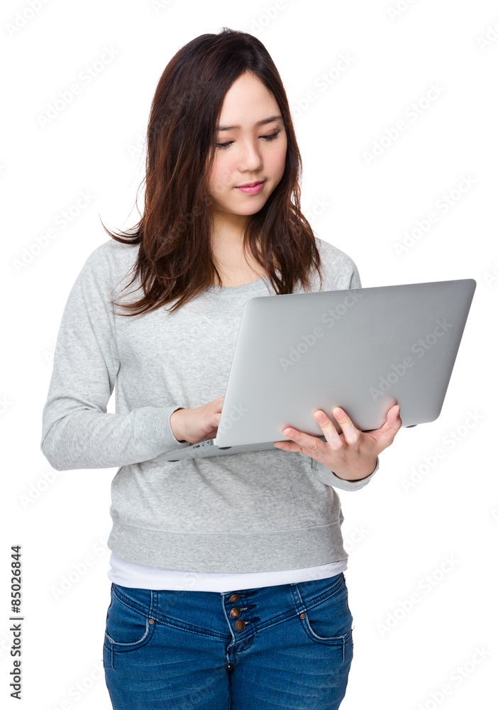 Asian woman use of notebook computer