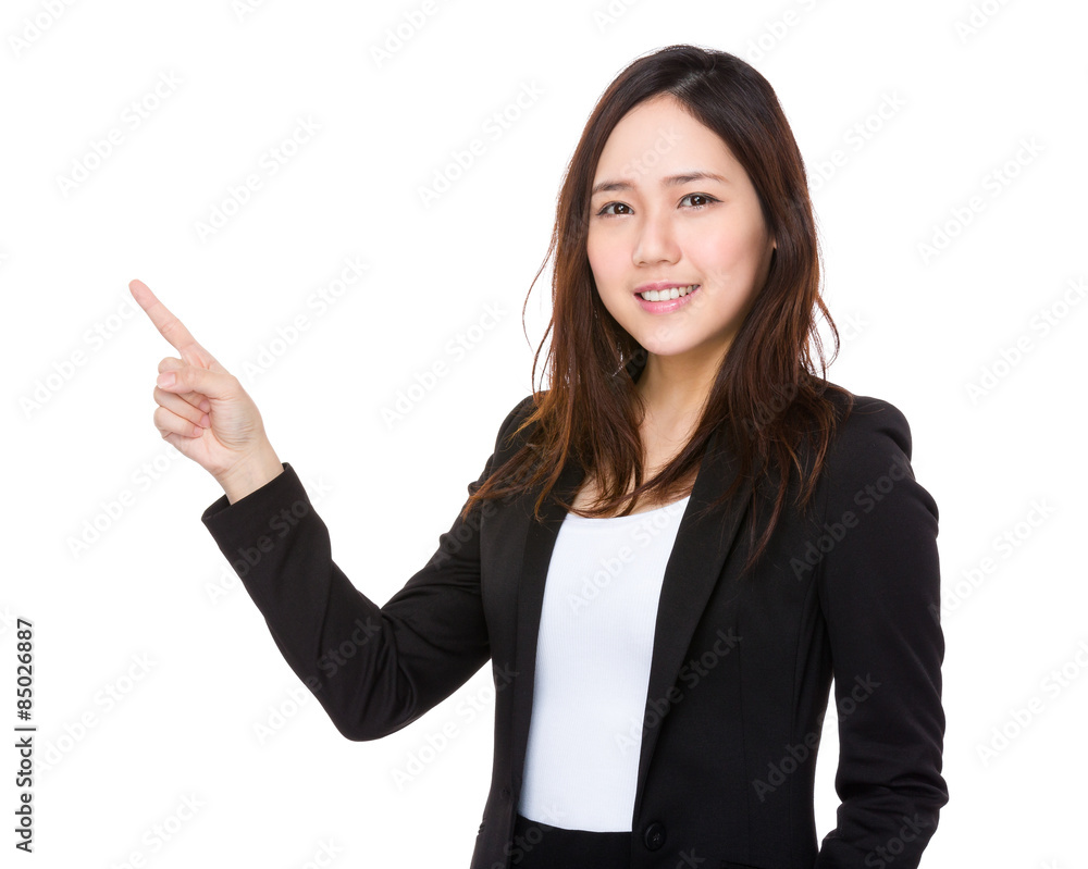 Young businesswoman with finger point up Young businesswoman with finger point up