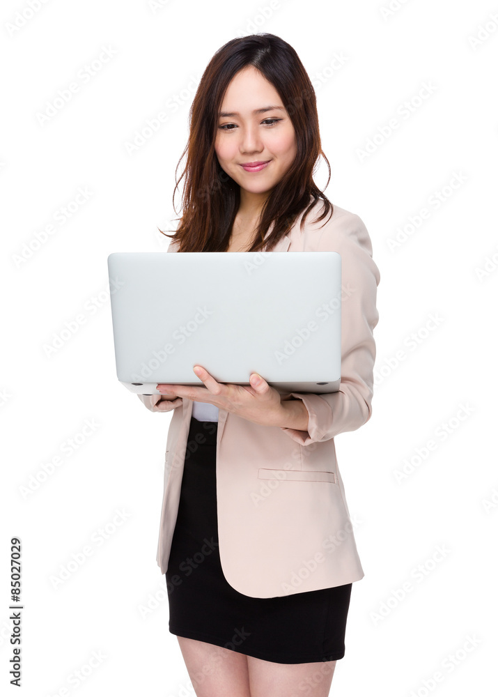 Businesswoman use of laptop computer Businesswoman use of laptop computer