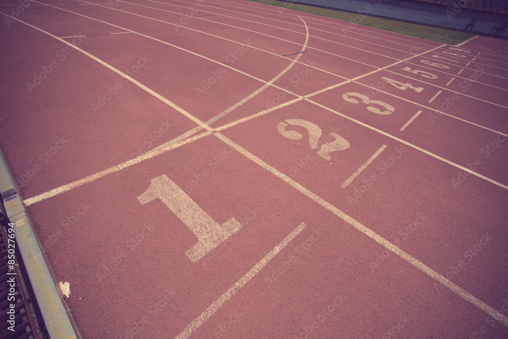 Numbers on running track  in stadium vintage color