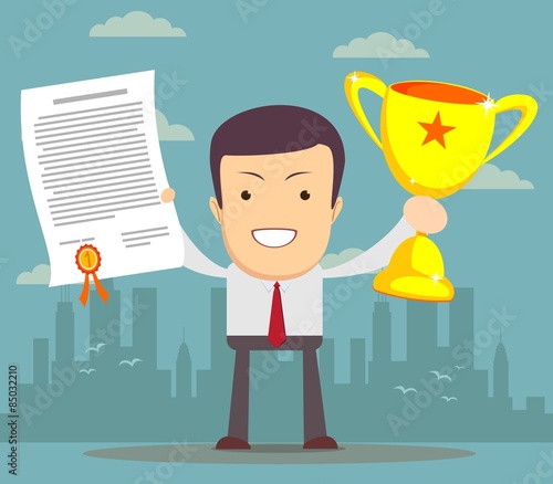 Man proudly standing holding up winning trophy and showing an