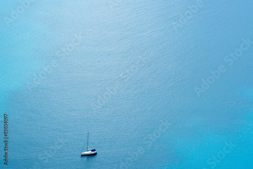 Sailing boat in the Mediterranean seen from a distance