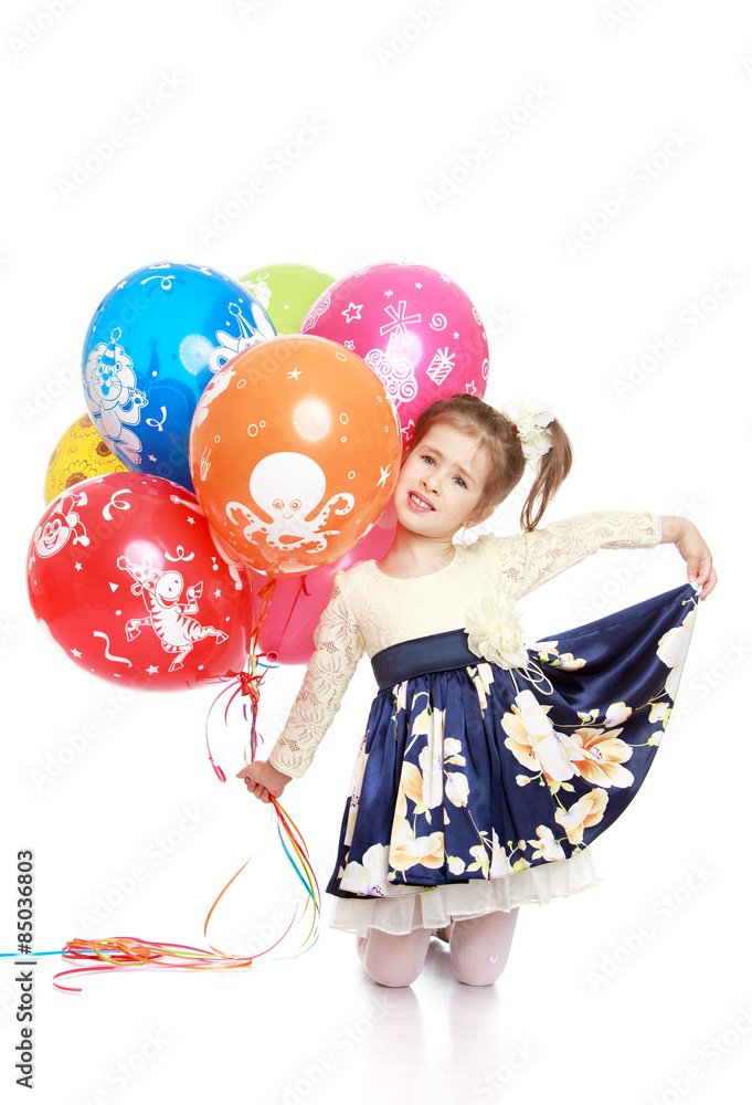 Elegant little girl in a beautiful long dress Elegant little girl in a beautiful long dress