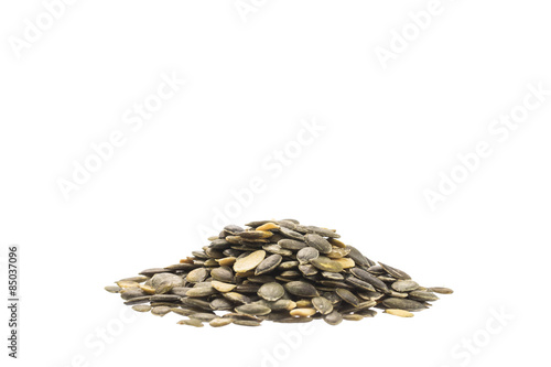 Pile of pumpkin seeds isolated on white background