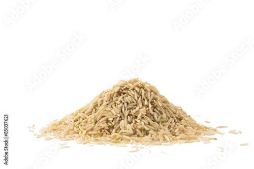 Pile of brown basmati rice isolated on white