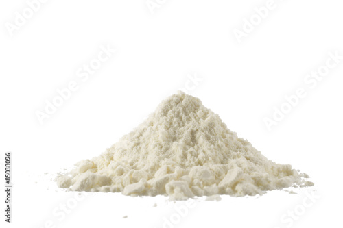 Heap of powdered organic milk isolated on white