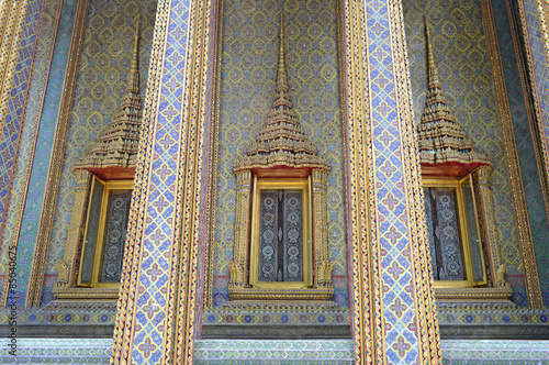 Thai style pattern wall and windows at Wat Ratchabophit, Bangkok, Thailand