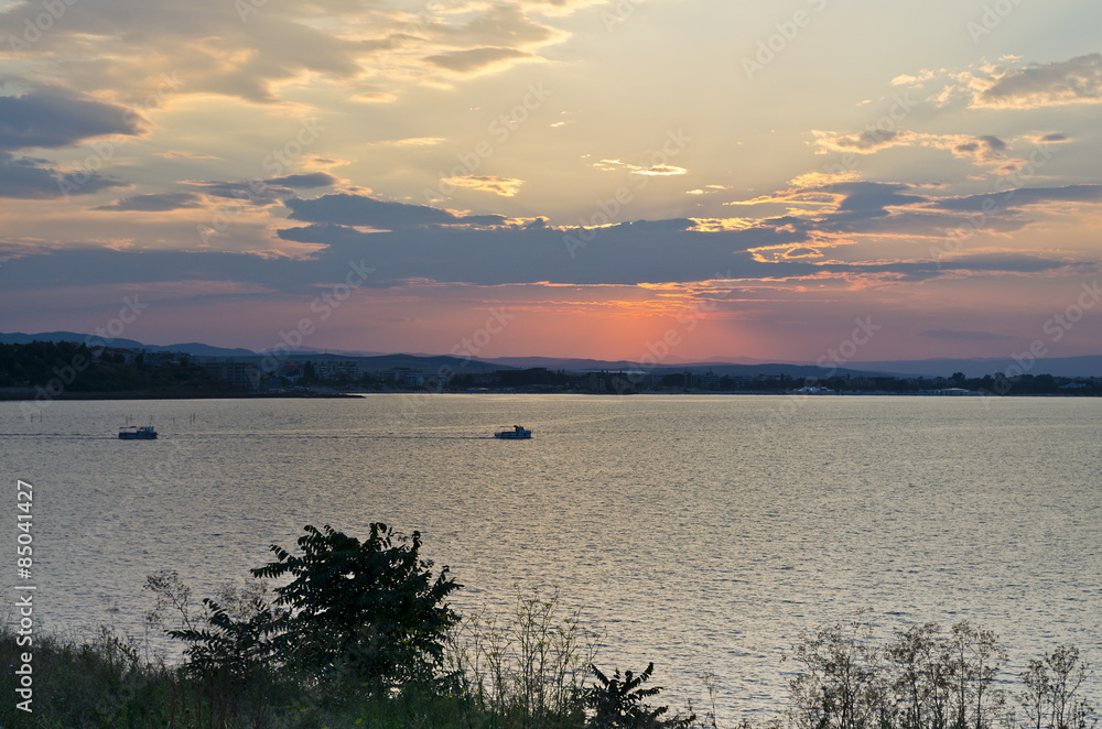 Fisher boat on the Black sea during sunrise