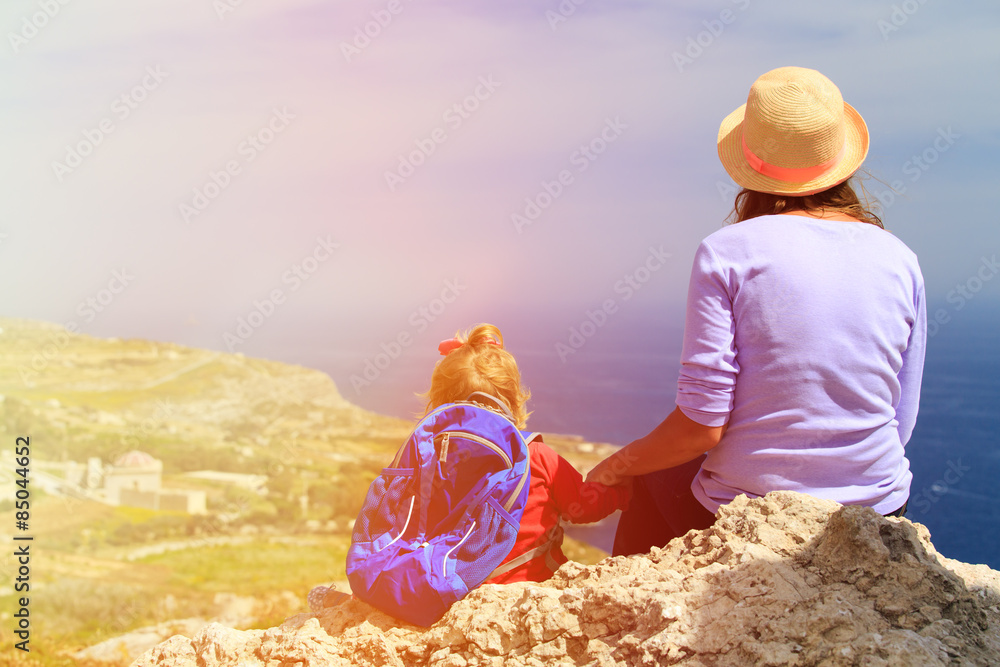 mother and little daughter travel in mountains mother and little daughter travel in mountains