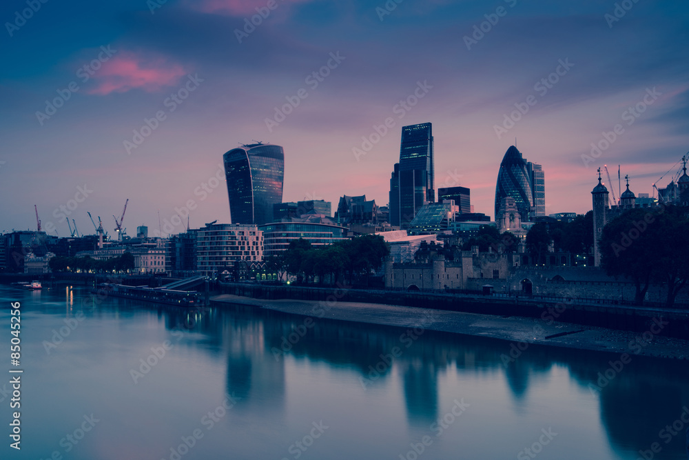 London skyline over river Thames, vintage photo effect