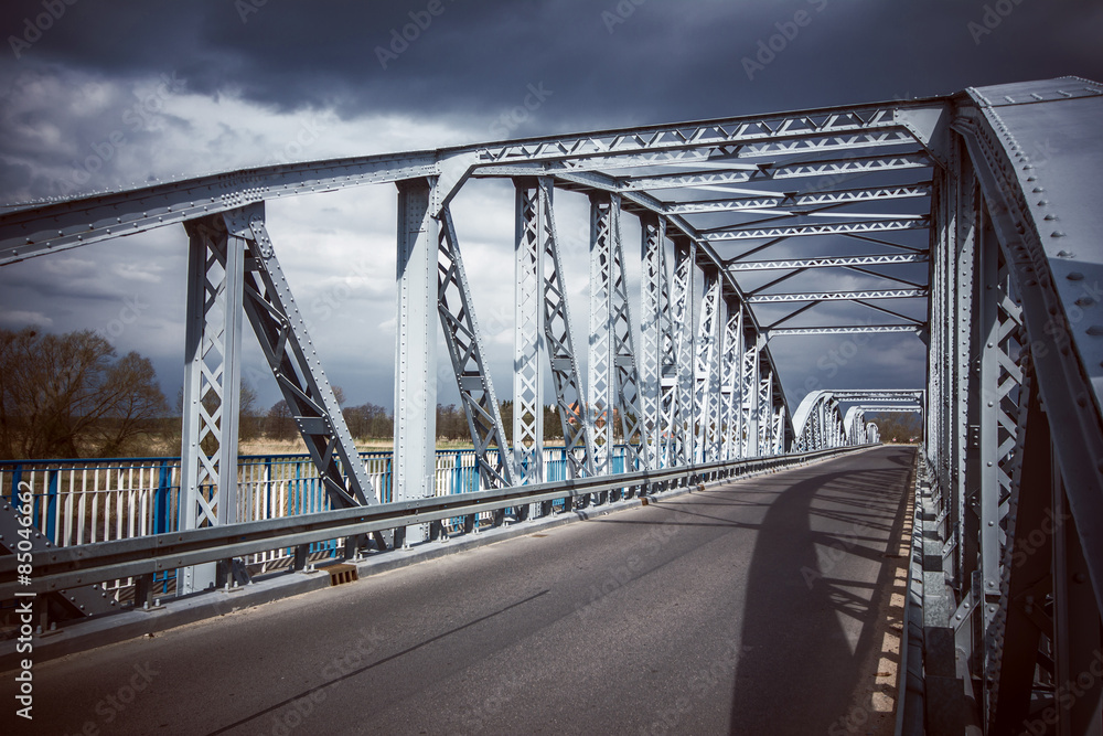 Fototapeta premium Vintage heavy metal bridge construction.
