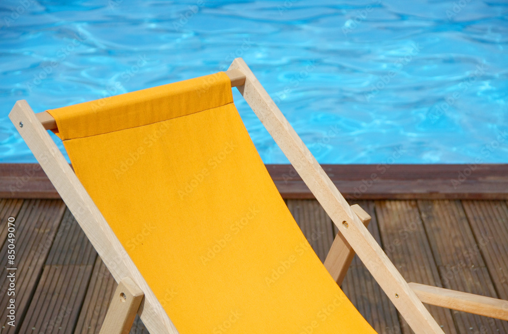 Deck chair by the swimming pool