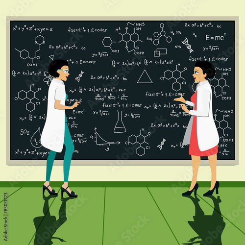 Scientists woman with blackboard writing research data in the background.
