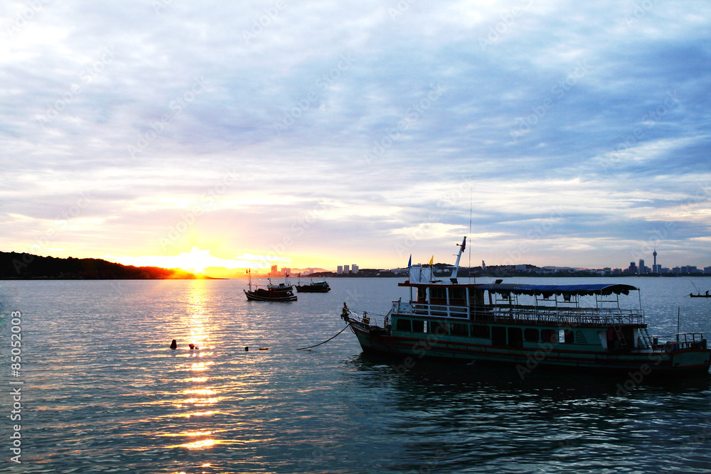 fishing boat at dawn