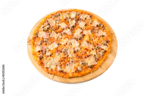 Tasty pizza on a wooden board
