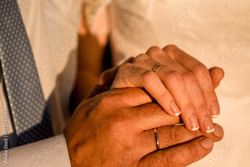 bride and groom are holding hands © deagreez