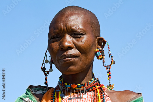 Portrait of a Maasai woman with traditional jewelry.
