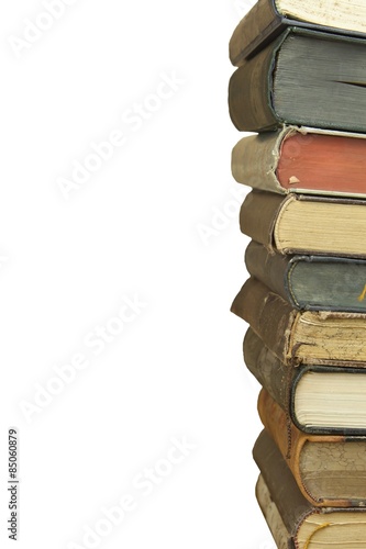 Front view of old books stacked on a shelf. Books without title and author. Isolated on white background, place for your text. 