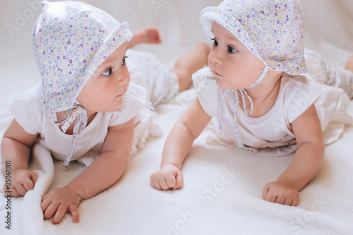 Funny twins sisters babies