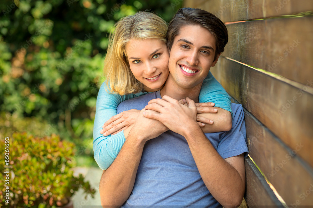 Attractive Couple dating in love hug and embrace with a smile Attractive Couple dating in love hug and embrace with a smile