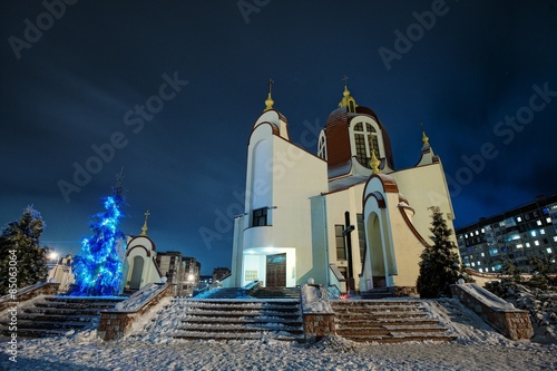 Church of st Petr on frozen evening photo