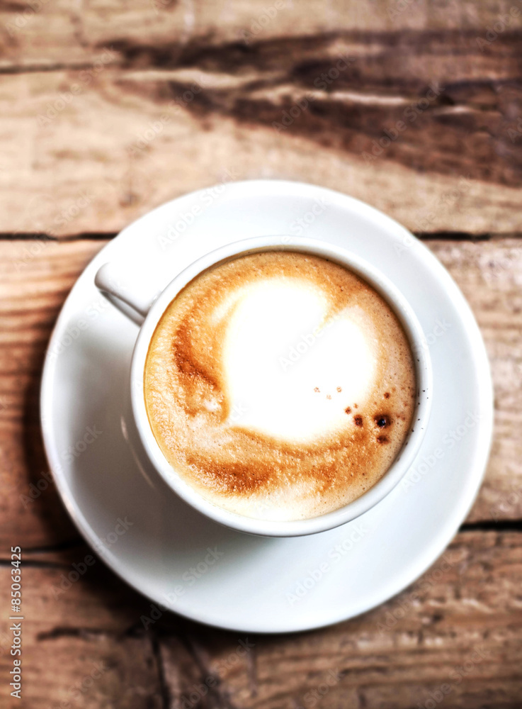 Cup of Coffee for breakfast on rustic wooden table, top view. Ca Cup of Coffee for breakfast on rustic wooden table, top view. Ca