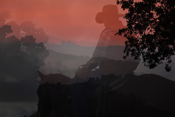 An artistic expression of a cowboy riding his horse in the mountains with black silhouette trees in a red background with text area.