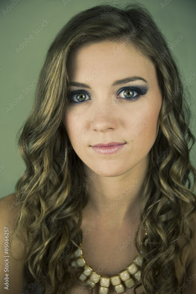 Beautiful young woman on green background Beautiful young woman on green background